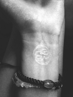 my neverending story white auryn wrist tattoo