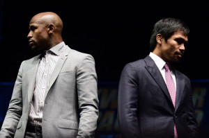 Floyd Mayweather Jr., left, and Manny Pacquiao during a news ...