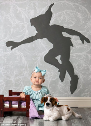 Cheeky: Peter Pan floats overhead as Maddie pouts into the camera as ...