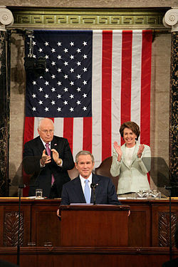 ... Vice President Dick Cheney and House Speaker Nancy Pelosi behind him
