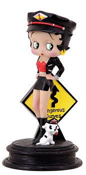 ... betty boop figurine featuring betty and pudgy next to a sign