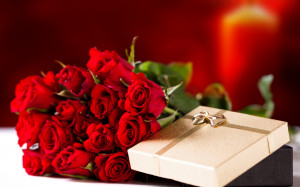 Bouquet of red roses on March 8 as a gift wallpapers and images