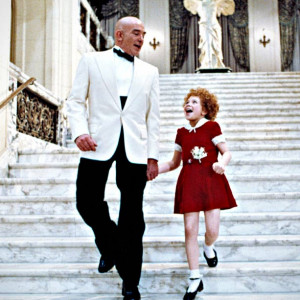 It's hard to resist the exuberance of little orphan Annie. Daddy ...