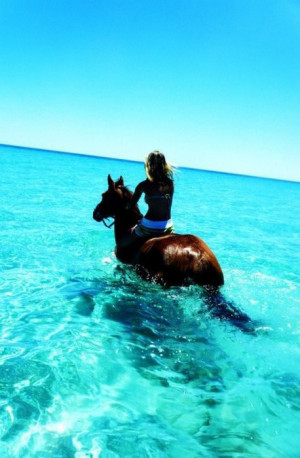 Horseback riding in the beautiful ocean!