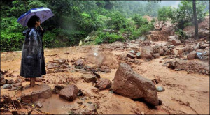 ... landslides crushed homes, bridges collapsed, and dozens of villages