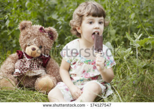 cute baby girl eating ice cream sweet curly toddler girl