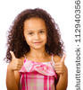 african american girl making a funny face against white background