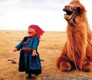 Beautiful Image – Laughing Mongolian Girl With Her Camel