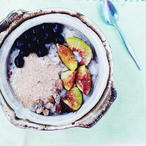 Brown rice/millet porridge topped with figs, blueberries, mulberries ...