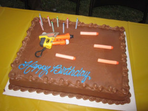 easy NERF cake- use real fun and bullets on sheet cake.