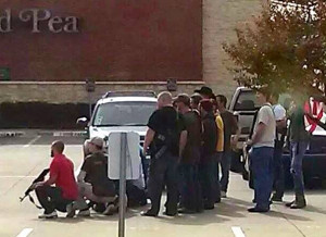 Open Carry Texas advocates stood in a parking lot outside a restaurant ...
