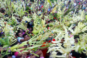 Catholic Palm Sunday 2013 Catholic devotees wave their
