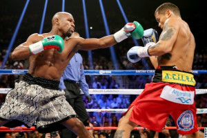 Mayweather was given one of his sternest tests of his career in their ...
