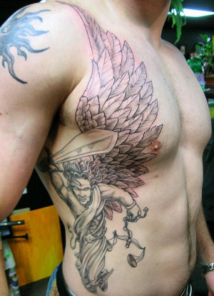 Tattoos.so » Big Angry Angel Tattoo on Rib