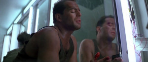 Bruce Willis as John McClane in Die Hard (1988)