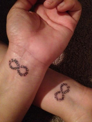 Infinity symbol and lettering tattoo design – couple tattoos idea