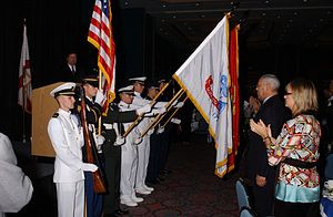 Company E-16 performs a Color Guard for Colin Powell