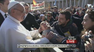 Pope Francis stopped his jeep to greet a disabled man in the square