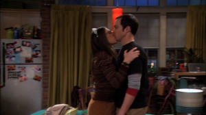 Amy kisses Sheldon at the spur of the moment.
