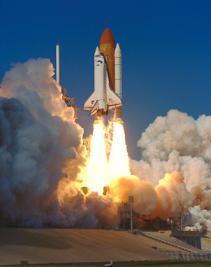 ... Space Shuttle Endeavour roars into space on mission STS-99. Liftoff
