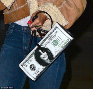 close up of Rihanna's money clutch