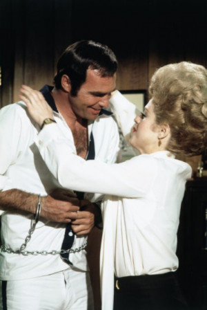... of Burt Reynolds and Bernadette Peters in The Longest Yard (1974