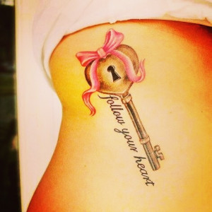 Bow And Key Tattoo With Quote On Rib Side