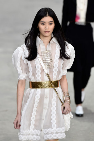 Ming Xi Model Ming Xi walks the runway during the Chanel show as part