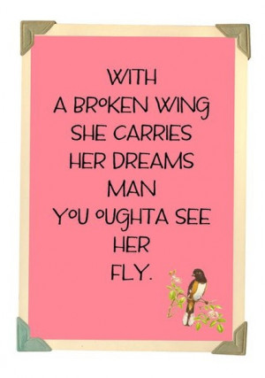 with a broken wing, she carries her dreams...