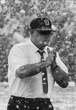 Legendary coach Woody Hayes shows his toughness to the weather at the ...