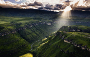 Sun shining through the clouds in Drakensberg, South Africa