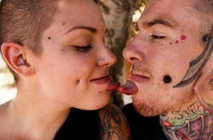 guy and gilr touching tongues, piercings, wtf pictures