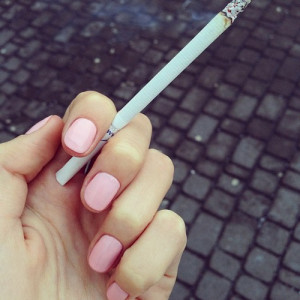 pretty girl uploads chic instagram cigarette rosy