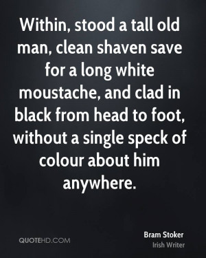 man, clean shaven save for a long white moustache, and clad in black ...