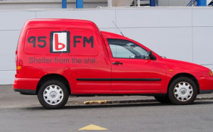 ... the sh*t” on the side of a radio station van on a public street