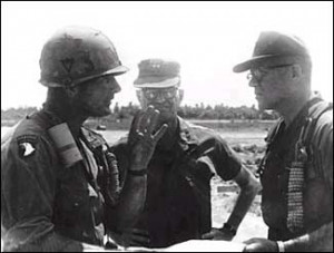 Col. David Hackworth briefs Gen. Julian Ewell (right)