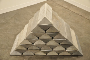 Carl Andre. Cast cement objects.