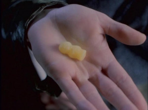 The Eighth Doctor offers a jelly baby. ( TV : Doctor Who )