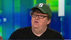 Michael Moore explains snipers are 'cowards' tweet
