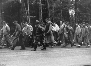 ... camp with other Jewish prisoners, pictured, in Dachua on the outside