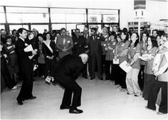 This is a picture of Sam Walton leading the Wal-Mart cheer. I work for ...