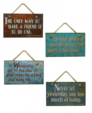one of these inspirational wall signs contains a quote from a famous ...
