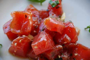 This is a staple in Hawaii. Ahi Poke. It is raw fish so be prepared ...