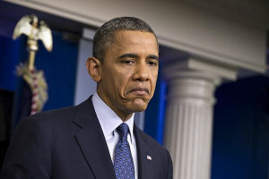 President Barack Obama pauses while talkig about the economy, Friday ...