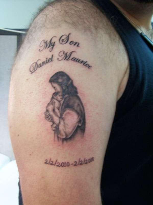 in memory of son it is a jesus holding the baby memorial sleeve tattoo