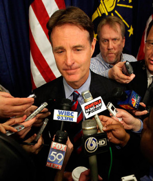 Sen. Evan Bayh, D-Ind., speaks with the reporters after a news ...
