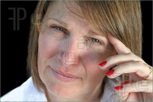 Thoughtful Middle Aged Woman Picture. Stock Picture at FeaturePics.com