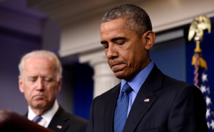 President Barack Obama, accompanied by Vice President Joe Biden ...