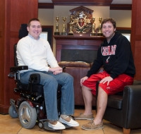 Mike Jarvis and fellow fraternity brother Chris O'Brien, BBA '13, hang ...