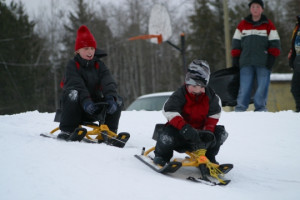 Kids have fun sliding down the hill